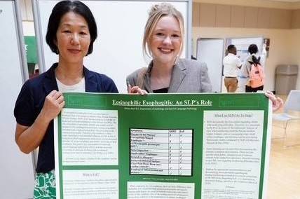 Dr. Aoyama and Kelsey Adair at the PAHS Graduate Student Research day 2025