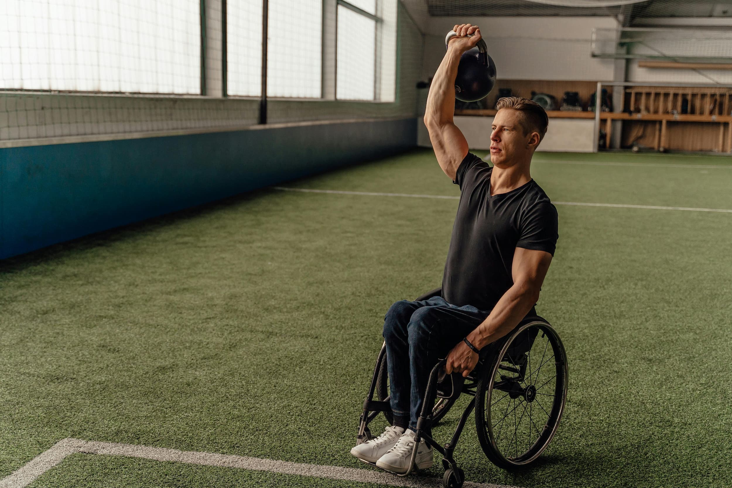 Man in a wheelchair working out