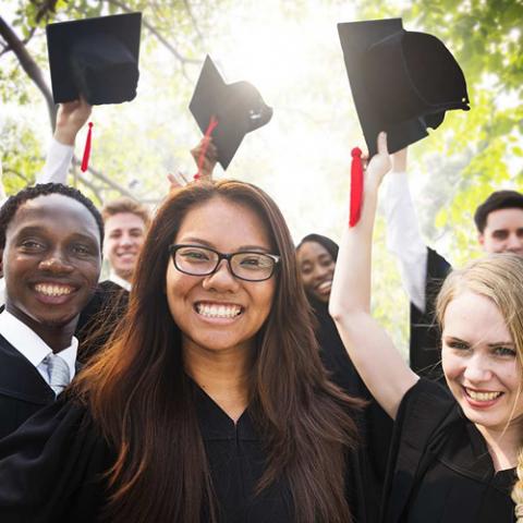 Students with Graduation Gowns