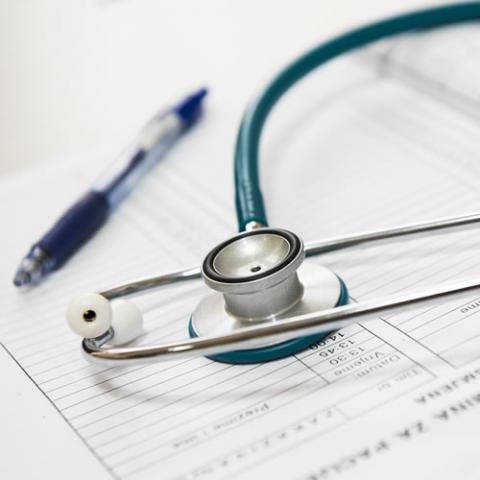 Stethoscope and patient's report